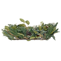 side view of christmas wreath featuring mixed foliage with pone cones highlight depth of wreath