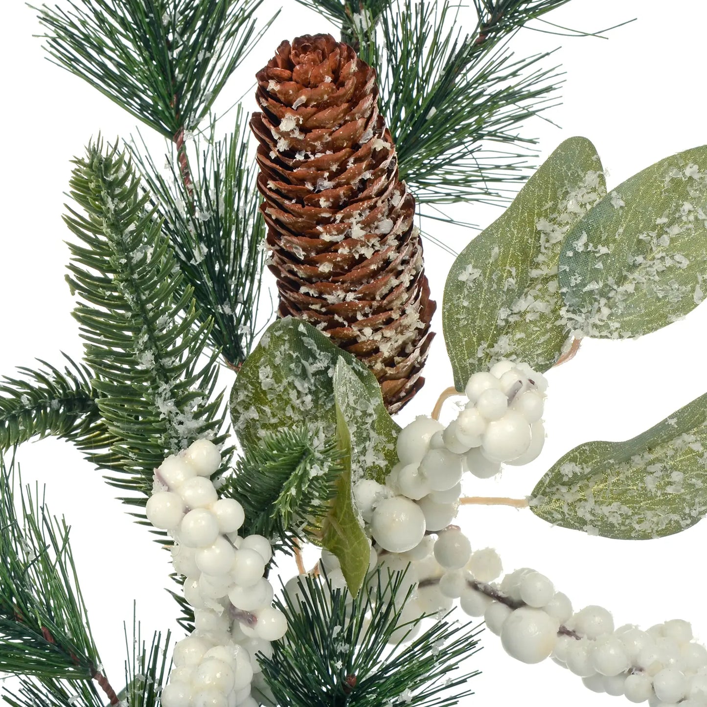 white berry clusters, frosted foliage and pine cones nestled between pine needles with frosted snow 