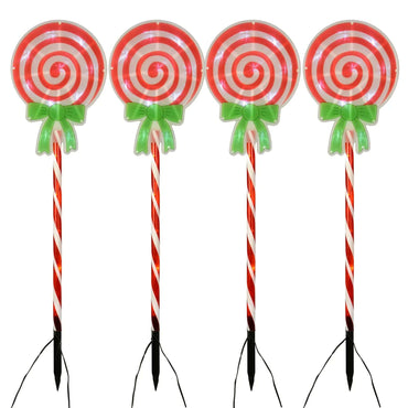 set of 4 lollipop swirl christmas pathway stake lights featuring green bow with red and white stripe design