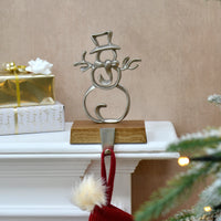 Mr Crimbo snowman shape silver metal Christmas stocking holder with wooden base