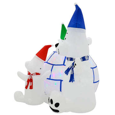 3 polar bears with red, blue and green hats and scarves beside an igloo lit by coloured disco lights