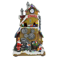 Elf made toys Christmas snow scene decoration with Santa and elves, moving mechanical gears and moving train