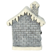 Back view of large grey brick house Christmas ornament with snow covered roof and chimney